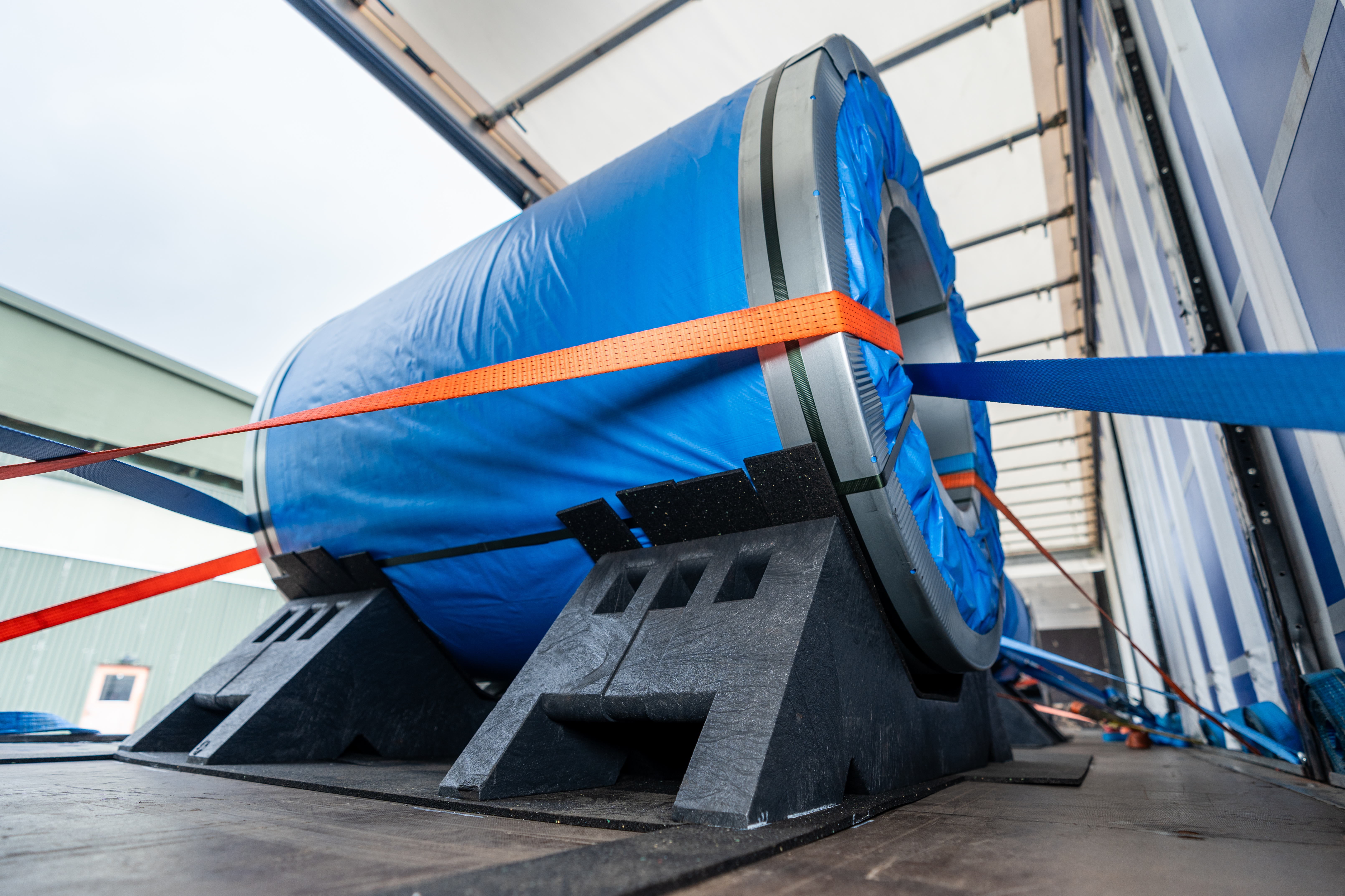 TÜV tested cradle for safe steel coil transport on flatbed semi-trailer