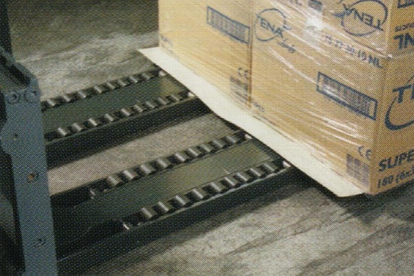 Ekon's Ekosheet under boxes picked up with a forklift truck's roller forks
